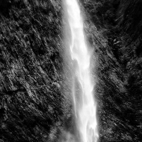 A boy by the waterfalls.