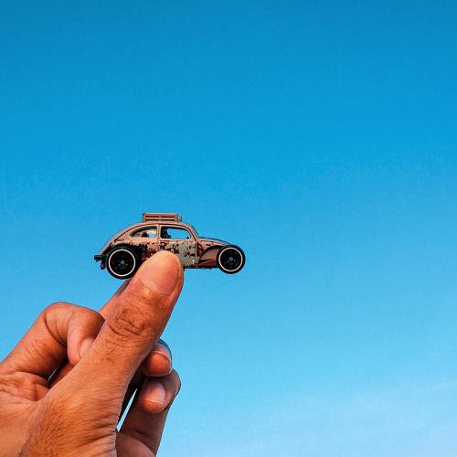 Holding a toy car
