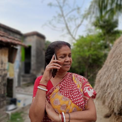 My mon talking on the mobile,and looking little bit happy...