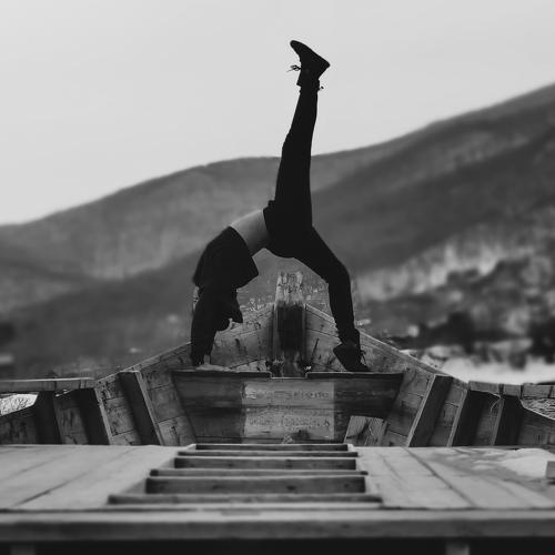 Backbend on the shore boat