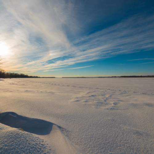 Late in the afternoon along the lake. Winter landscape