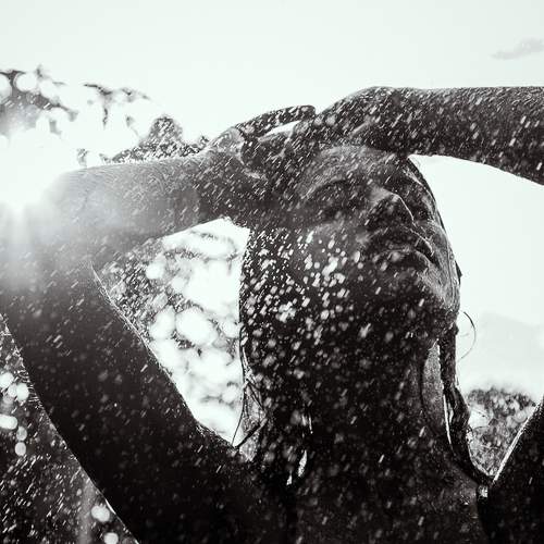 woman on the rain in bnw