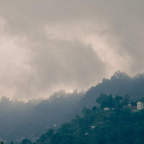 The mountain sleeps leaning against the sky...