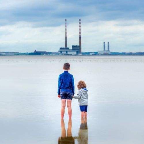 Kids looking at Poolbeg Towers
