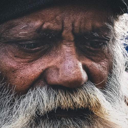 Man with beard like Great philosopher osho