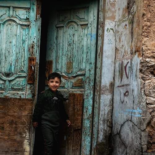 A child with an old house