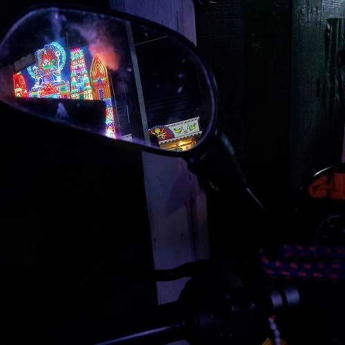 Reflection in the mirror of a bike.