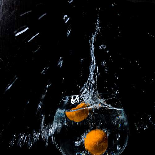 splashing water from a large glass