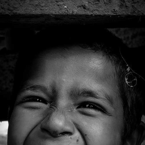 A street child whose eyes are full of dreams.