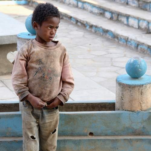 Kid with look of adult on Madagascar