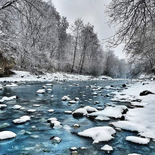 Mountain river in ice