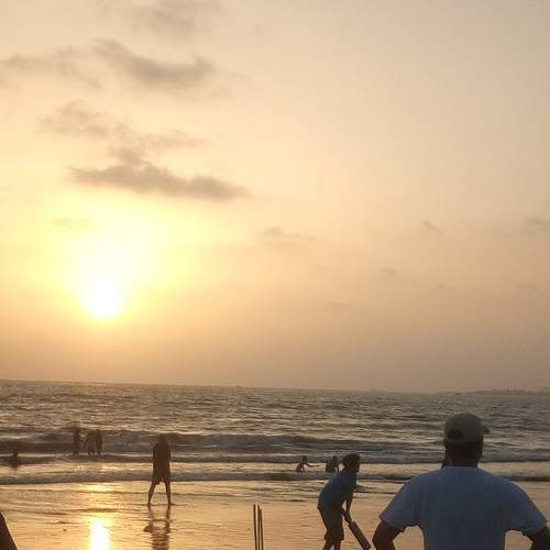 Beach Cricket at Sunset