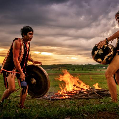 Gong and Drum performance around bonfire