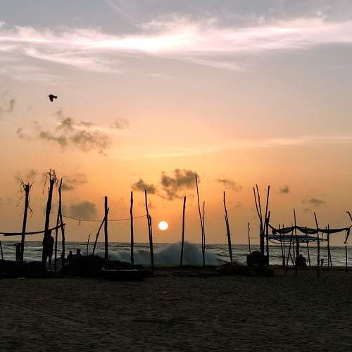 A Sandy Sunset and Silhouettes