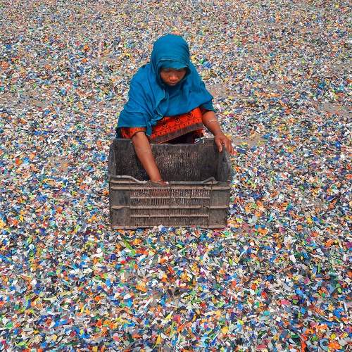 Processing of plastic waste into recyclables.