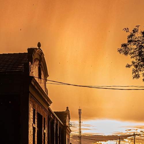 Railway station on a rainy golden sunset