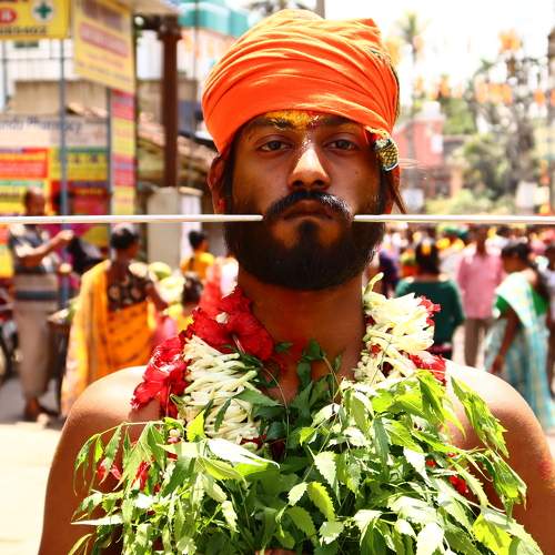 GOD DEVOTEE WITH PIERCED CHEEKS