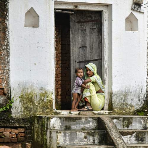 A young mother with her son in India.