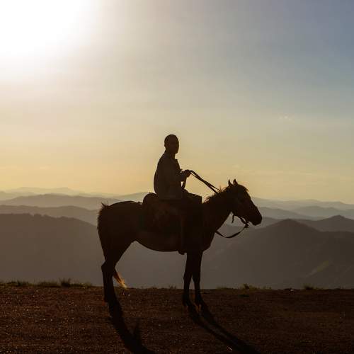 A man with local horse in Gadabay mountains Azerbaijan