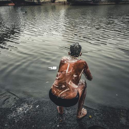 While bathing at the river side....