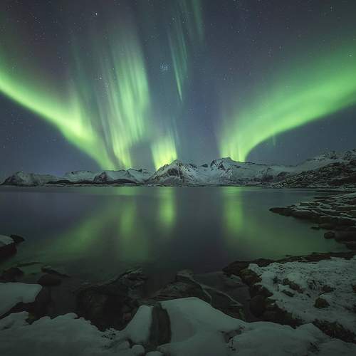 Aurora over jagged ice