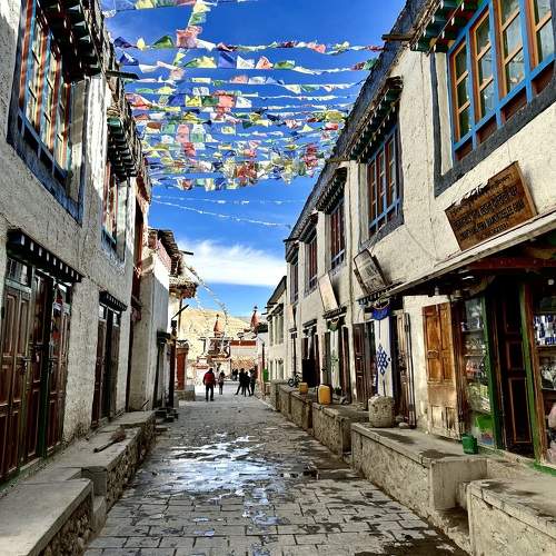 Whispers of Prayer Flags: A Sunlit Journey in Lo Manthang