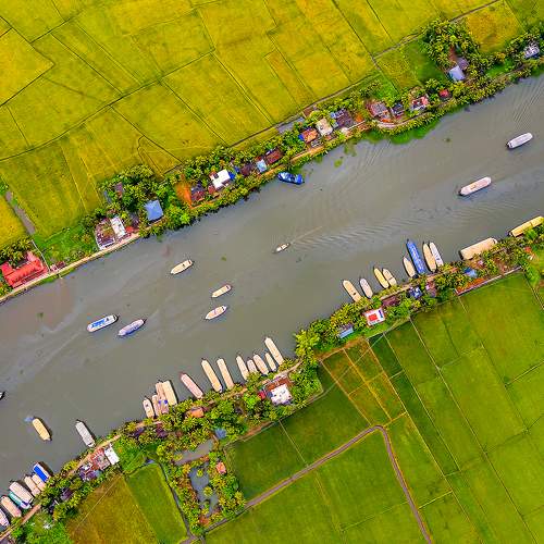 HOUSEBOATS RUNNING THROUGH BACKWATERS