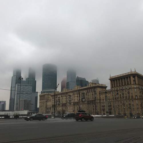 Город