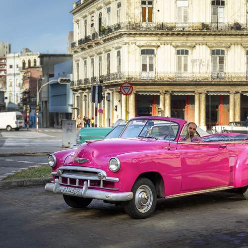 Daniel and his pink Chevrolet.