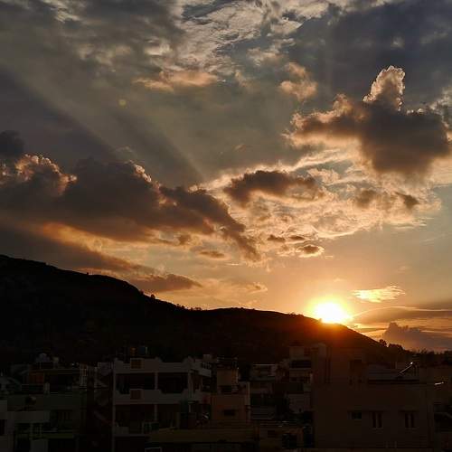 Beam of sunlight shining  through the town