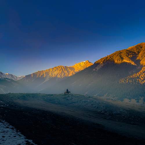 Basking in the warm embrace of mountain twilight
