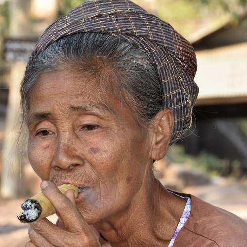 Cheroot smoking woman