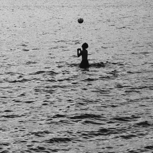 Play football in the river