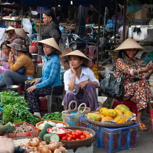 Vegetable sellers at the market in HoiAn, Vietnam