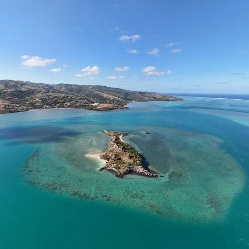 Aerial View of a Serene Island and Coastal Landscape