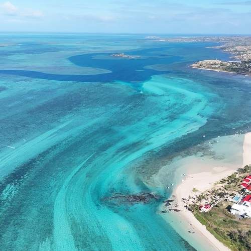 Aerial View of Pristine Coastal Waters and Resort