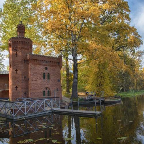 Church on the shore of an autumn lake