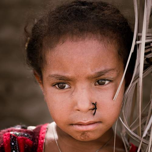 A child is expressing her dreams through her eyes.