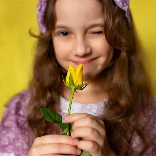 Girl and Yellow Roses