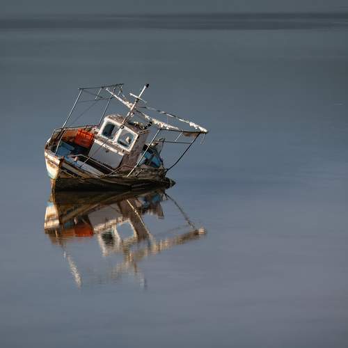 Abandoned boat aground