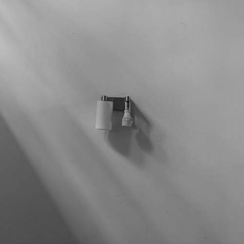 Sconce in shadow