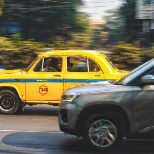 NEW PRIVATE CAR & A VINTAGE TAXI CAR IN KOLKATA