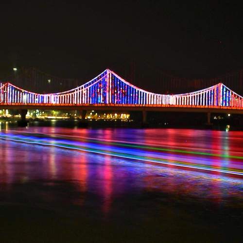 Illuminated Suspension Bridge at Night