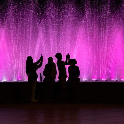 People near a fountain in the center of Tbilisi, Georgia.