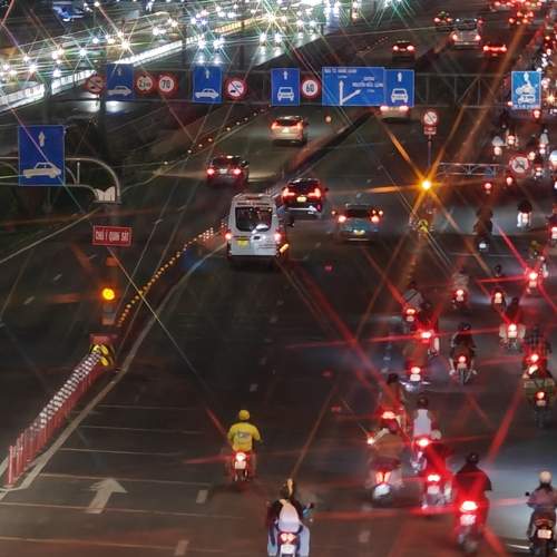 The lights and stars illuminating the road