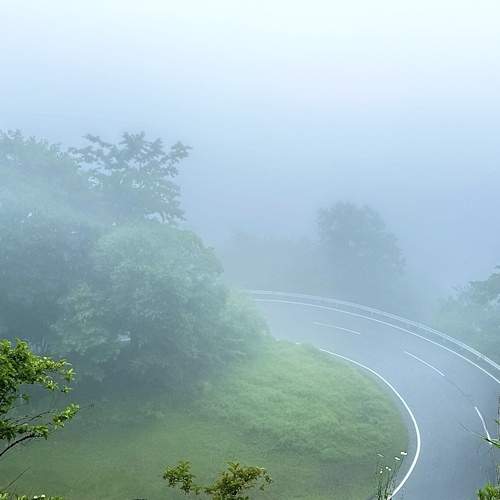 Foggy Road in the Mountains