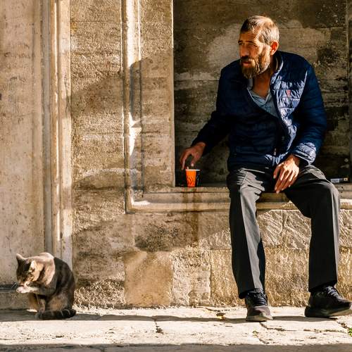 Old Man and Cat on the Street in Istabul, Turky
