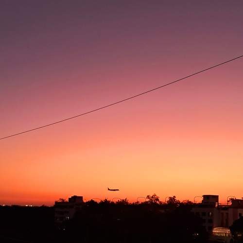 Flight landing with sunset