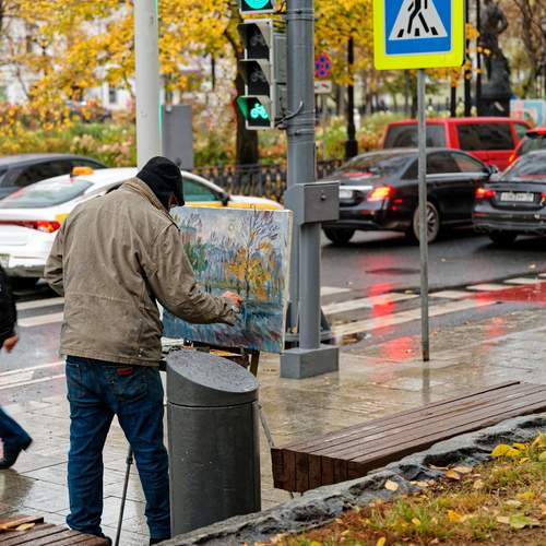 Уличный живописец