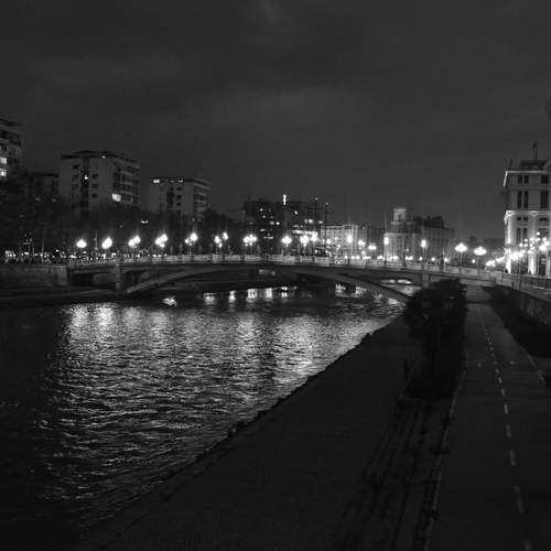 Macedonia, Skopje, River Vardar at night.